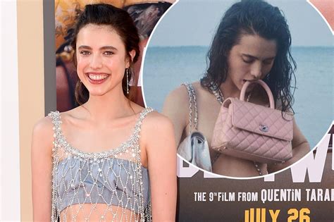 Margaret Qualley poses nude covered in Chanel bags